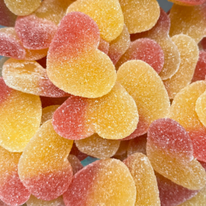 Peach Hearts fruity chewy heart shaped sweets with sugar coating from Planet Pick n Mix
