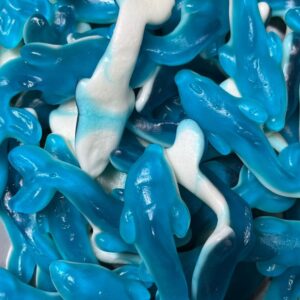 Large blue raspberry dolphin jelly sweets with bright blue colour and chewy texture