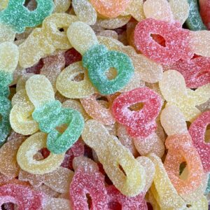 Sour dummy sweets with colourful coating and chewy texture in pick n mix selection